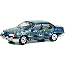 Greenlight 44980-A Hollywood Series 38 - Tommy Boy - 1986 Taurus - Zalinsky Auto Parts Crash Test Vehicle 1/64 Scale Diecast